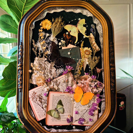 Vintage Frame with Antique Books, Butterflies, and Flowers